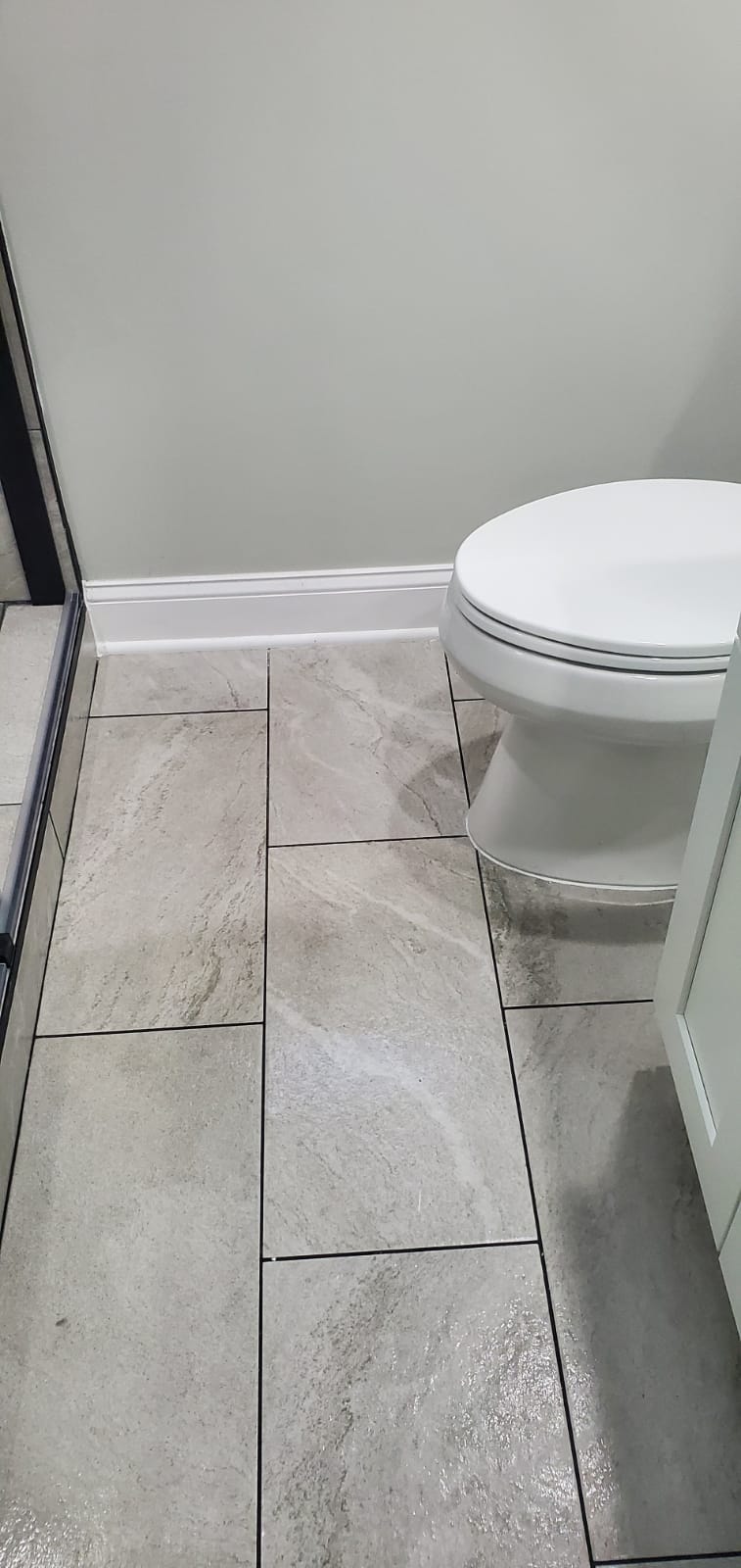 Elegant custom vanity and mirror sink setup completed